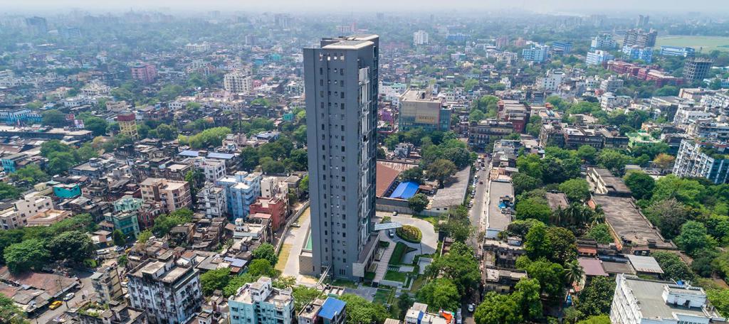 high-rise building among city blocks